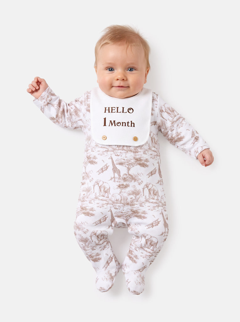 "Hello 1,3,6,12 Months" Embroidered Baby Grow with Attached Small Bib - Safari Collection - Beige
