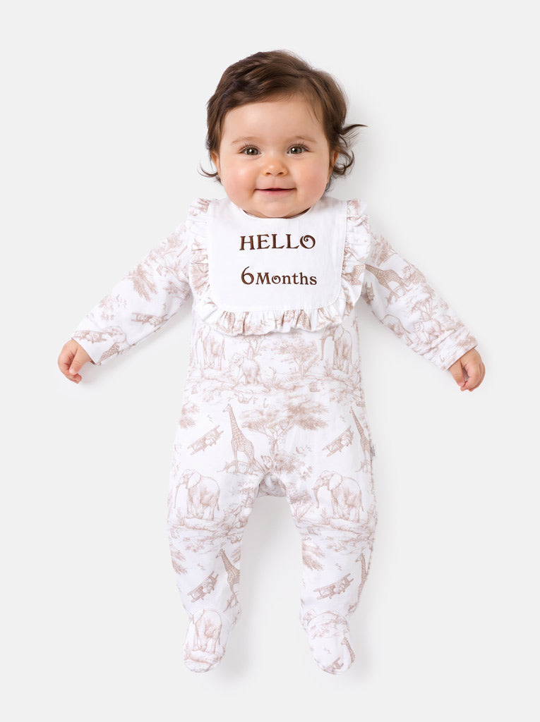 "Hello 1,3,6,12 Months" Embroidered Baby Grow with Frilled Bib - Safari Collection - Beige