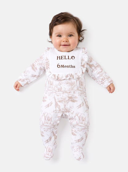 "Hello 1,3,6,12 Months" Embroidered Baby Grow with Frilled Bib - Safari Collection - Beige