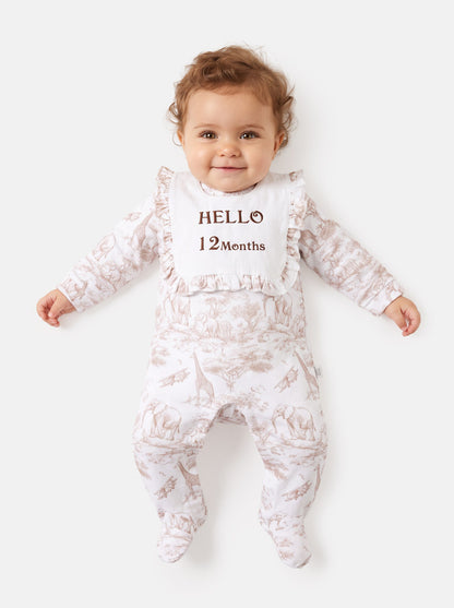 "Hello 1,3,6,12 Months" Embroidered Baby Grow with Frilled Bib - Safari Collection - Beige